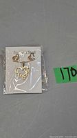 Necklace and earring set in package on display card