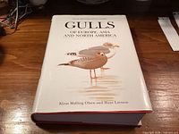 Front cover of hardcover book showing title, authors and gull illustration