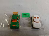 Both Hot Wheels cars in plastic bag