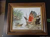 Full view of framed oil painting