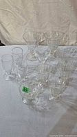 Group shot of all 11 pressed glass pieces