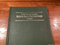 Front cover of hardcover book showing title and series line