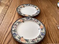 Two Mikasa Garden Harvest dinner plates top view