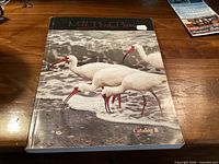 Front cover of Mill Pond Press Catalog B with ibises artwork