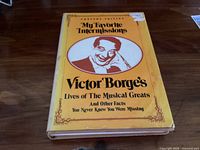 Front dust jacket showing title, author, portrait, jacket wear