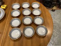 Twelve matching Noritake Scheherazade bowls arranged on table