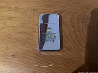 Front view of Zippo lighter showing RCAF crest