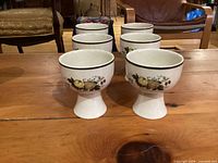 Six Royal Doulton Cornwall stoneware goblets on table