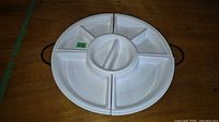 assembled set showing all dishes fitted in stand