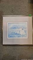Front view of framed print showing image, mat and frame