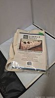 Packaged Simple Nest canvas shoe organizer showing full product in bag