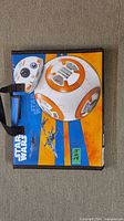 Front view of Star Wars carrying folio featuring BB-8 artwork and handle