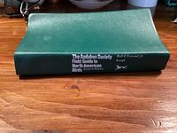 Spine view of green softcover Audubon field guide