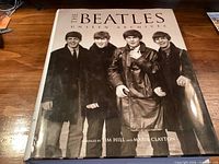 Front dust jacket of The Beatles Unseen Archives hardcover book