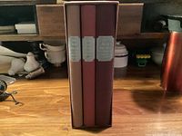 Three clothbound Thomas Hardy novels in slipcase, spines visible