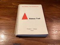 Front cover of Rideau Trail Guidebook showing title, logo, location and year
