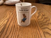 Front view showing Peter Rabbit illustration and text