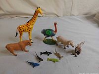 Group shot showing all ten toy animal figures