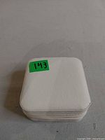 Closed white square jewelry case