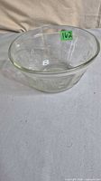 Top angled view of clear embossed floral glass bowl