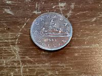 Obverse of 1983 Canadian Voyageur dollar coin