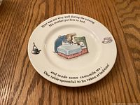 Top view of Peter Rabbit plate showing illustration and text