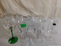 Front view of nine assorted glasses