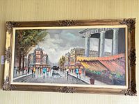 Full view of framed oil painting on wall