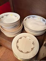 Stacks of plates and bowls showing quantity and pattern