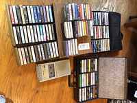 Overall lot: recorder, four storage cases, numerous cassettes