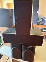 Front view of stacked Energy and Mission speakers