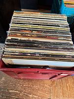 Crate filled with stacked LP records