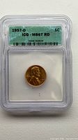 Front of encapsulated 1957-D Lincoln Wheat Cent with ICG label showing grade MS67 RD