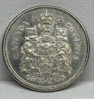 Reverse showing Canadian Coat of Arms and date 1962