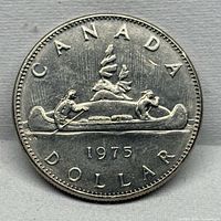 Reverse of 1975 Canadian Voyageur dollar coin