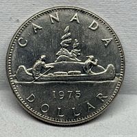 Reverse showing CANADA DOLLAR 1975 with Voyageur canoe design