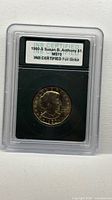 Slabbed 1980-S Susan B. Anthony dollar coin front view with INB label