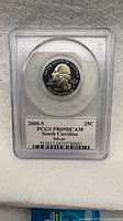 Front of PCGS slab showing obverse and label with grade PR69DCAM