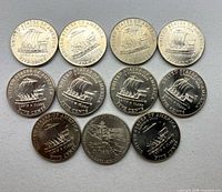 11 reverse sides showing commemorative designs