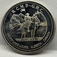 Obverse showing RCMP officer on horse and location text