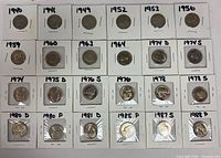 Grid of 24 individually holdered Jefferson nickels labeled by year and mint mark