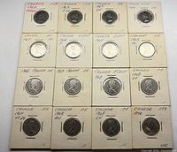 Overall view of 16 Canadian nickels in labelled flips