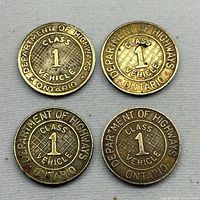 Four tokens showing CLASS 1 VEHICLE side