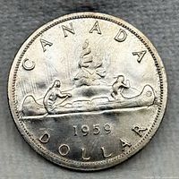 Reverse of 1959 Canadian Voyageur silver dollar