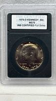 Slabbed obverse view showing INB certification label and coin
