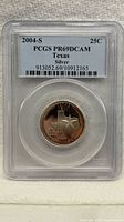 Front of PCGS slab showing label and Texas silver proof quarter