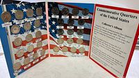 Open album showing filled slots of state quarters and descriptive panel