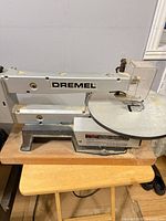 Full view of Dremel 16" scroll saw on wood base