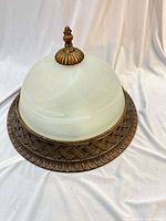 overall view of frosted glass dome light with metal rim