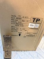 Shipping case showing item number, pack quantity and origin plus one incense burner displaying bronze relief design